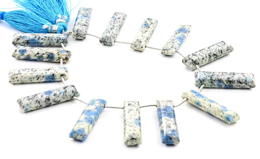 K2 Granite 7x28mm Faceted Rectangle gemstone bead strand