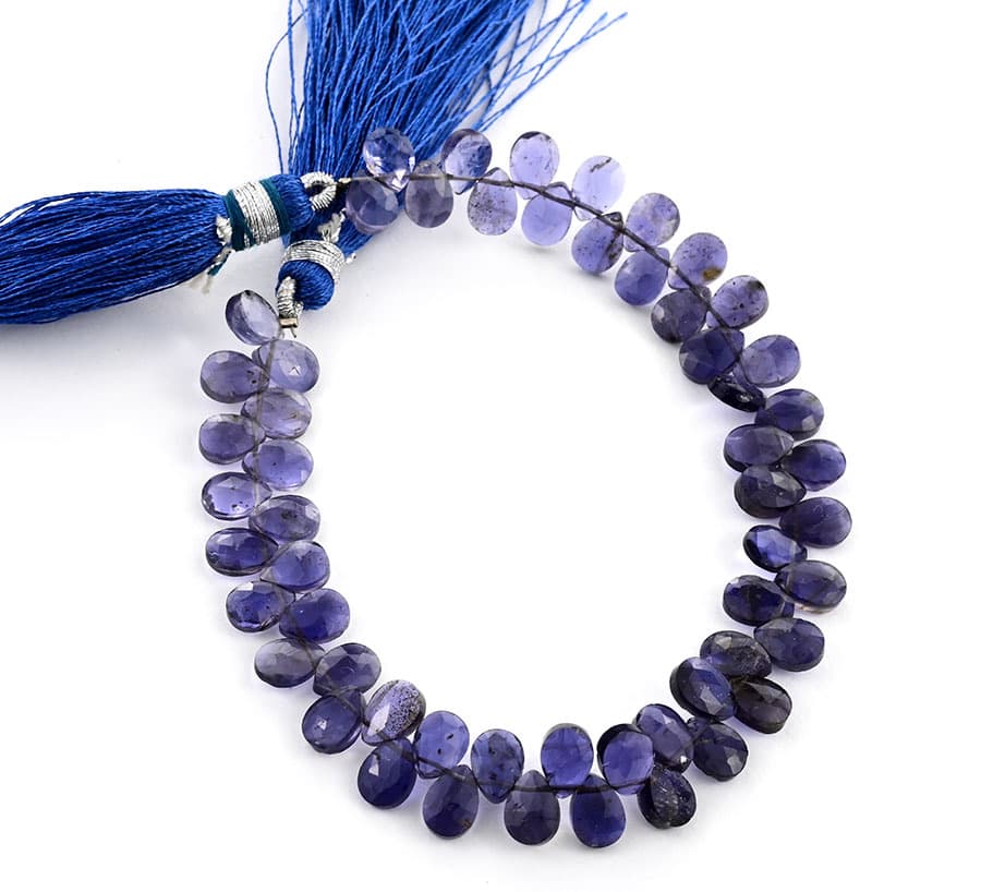 Iolite 5X7mm Faceted Pear(Calibrated) gemstone bead strand