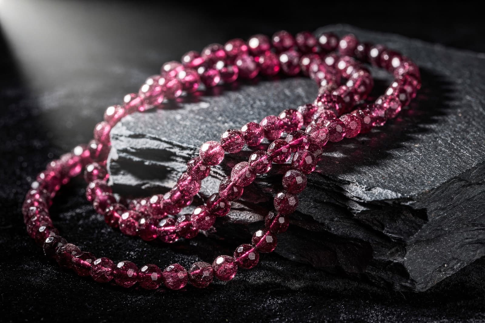 Red Mozambique garnet beads, styled illustration