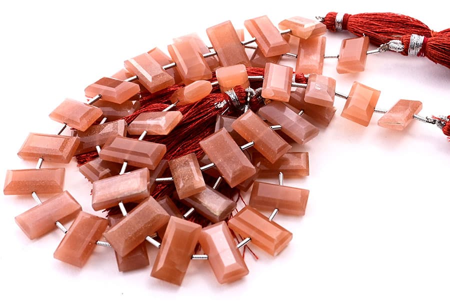 Peach Moonstone 8x16mm Faceted Rectangle Center Drill gemstone bead strand