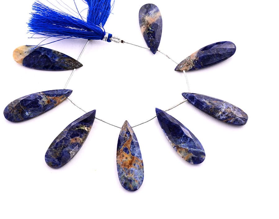 Carnelian in Sodalite 15x45mm Faceted Pear gemstone bead strand