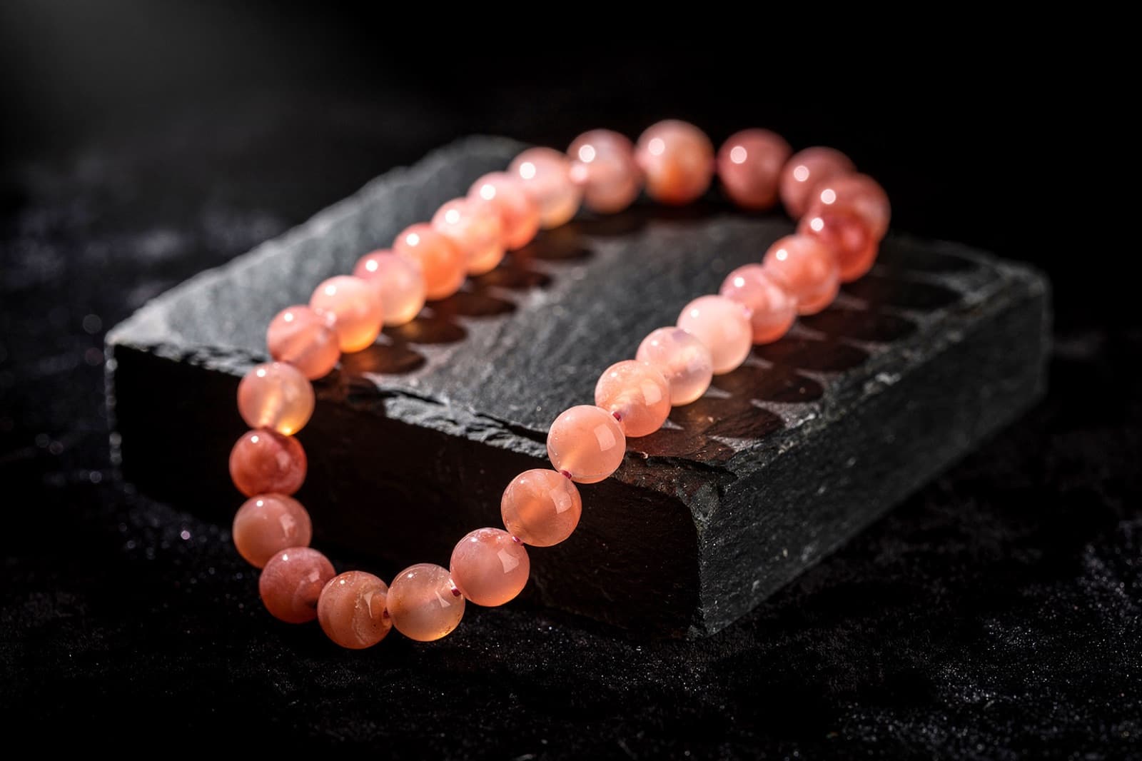 Pink opal beads, styled illustration