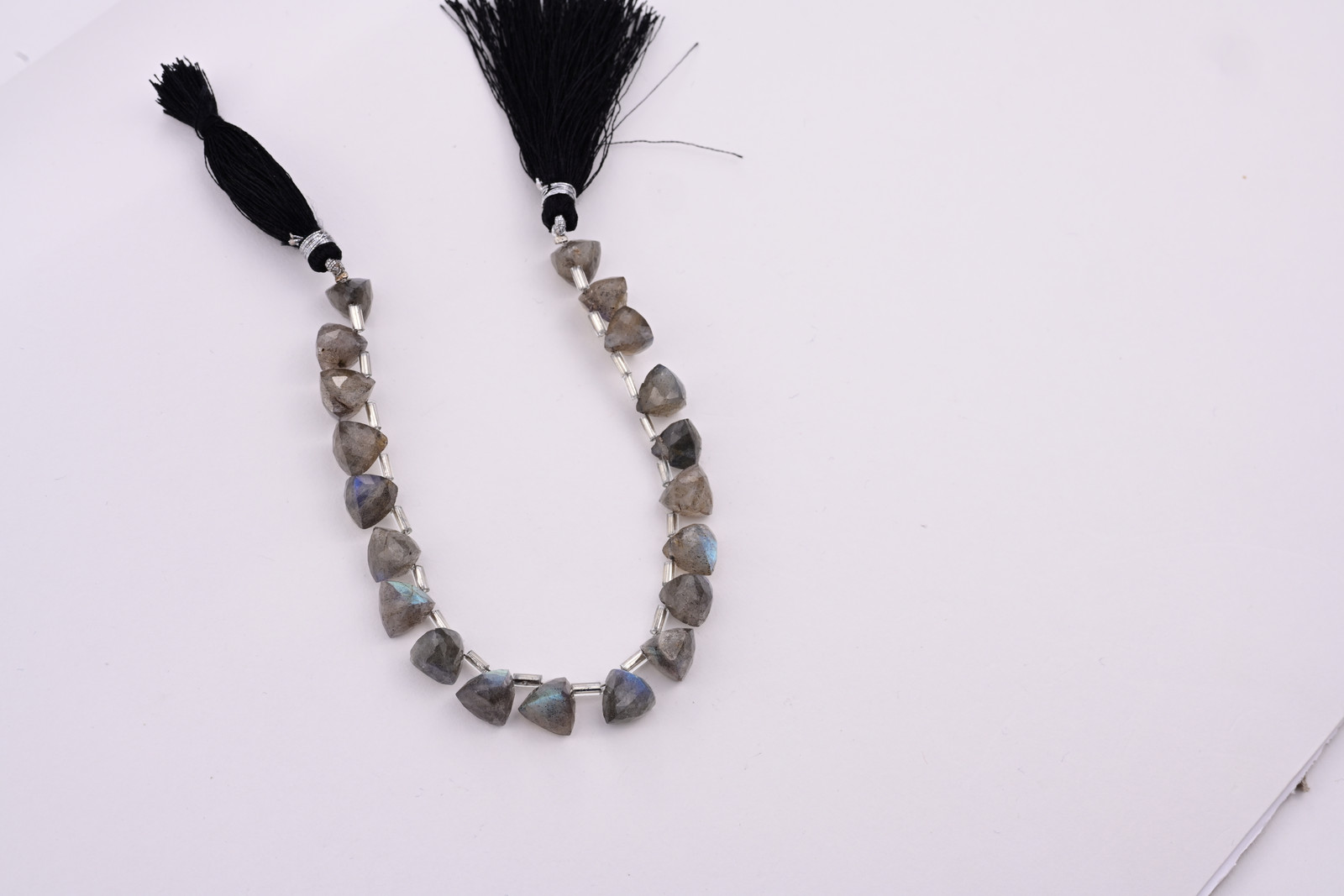Labradorite strand, a photograph from the Tandon Gems archive