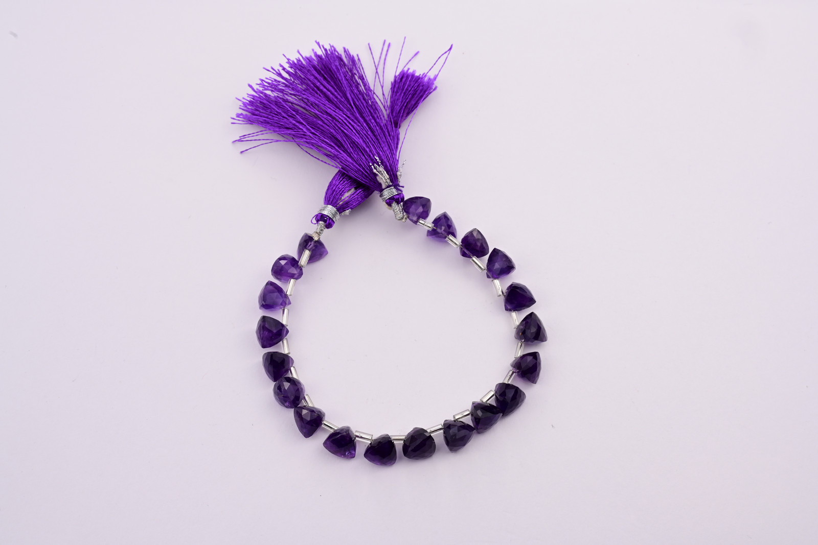 Amethyst strand, a photograph from the Tandon Gems archive