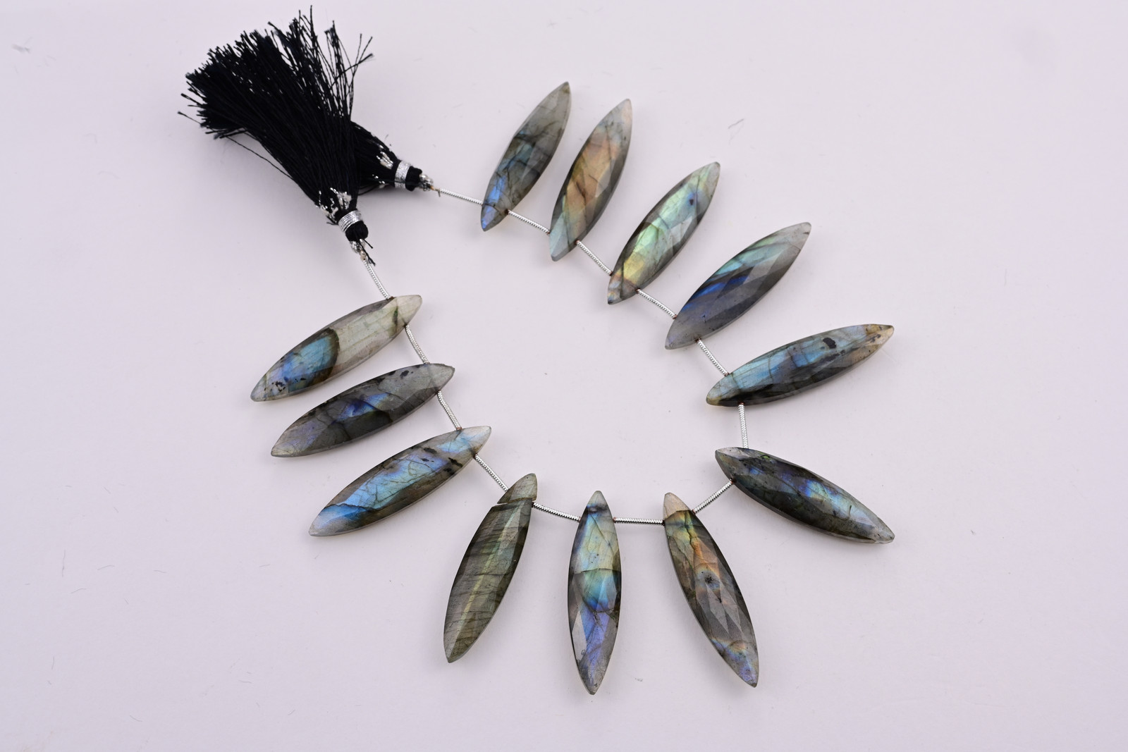 Labradorite strand, a photograph from the Tandon Gems archive
